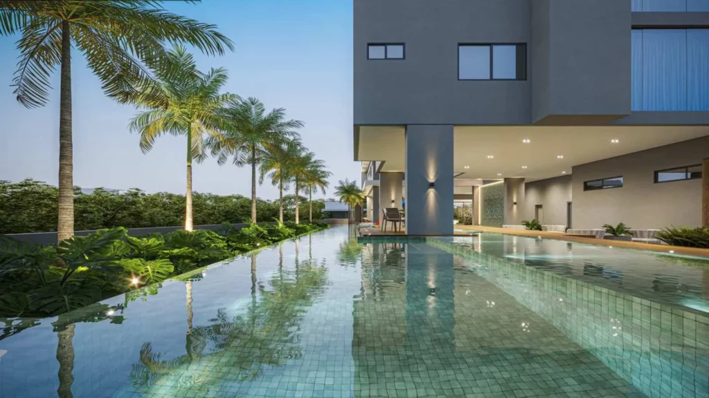 Piscina externa do Infinity Home Club em Umuarama - condomínio de alto padrão com lazer exclusivo